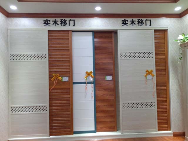 環保板材品牌家湘美柜體同色實木移門.jpg